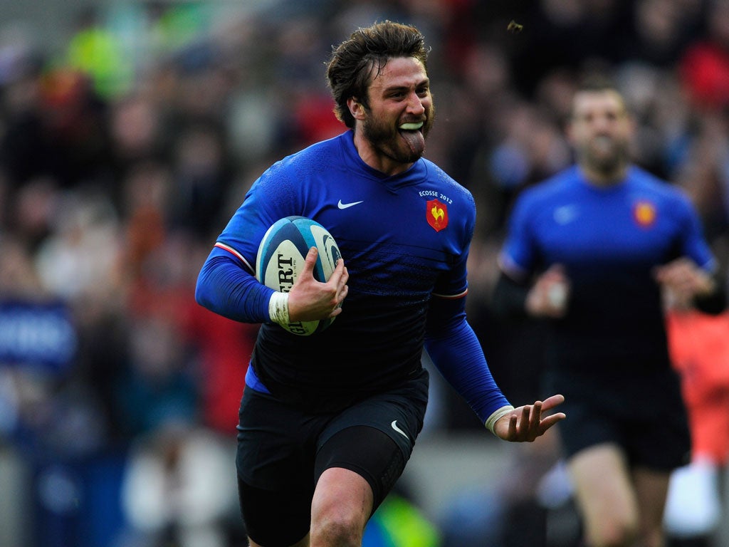 France fullback Maxime Medard runs in his try during the RBS Six Nations match between Scotland and France