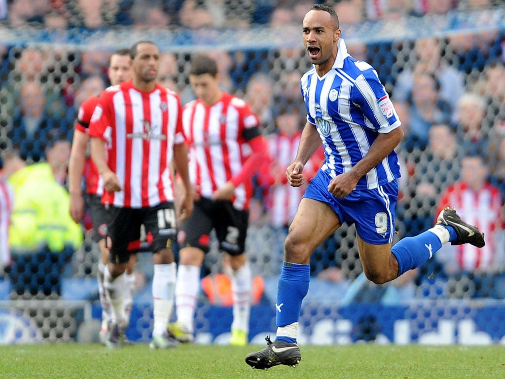 Chris O’Grady turns away after scoring Sheffield Wednesday’s winner