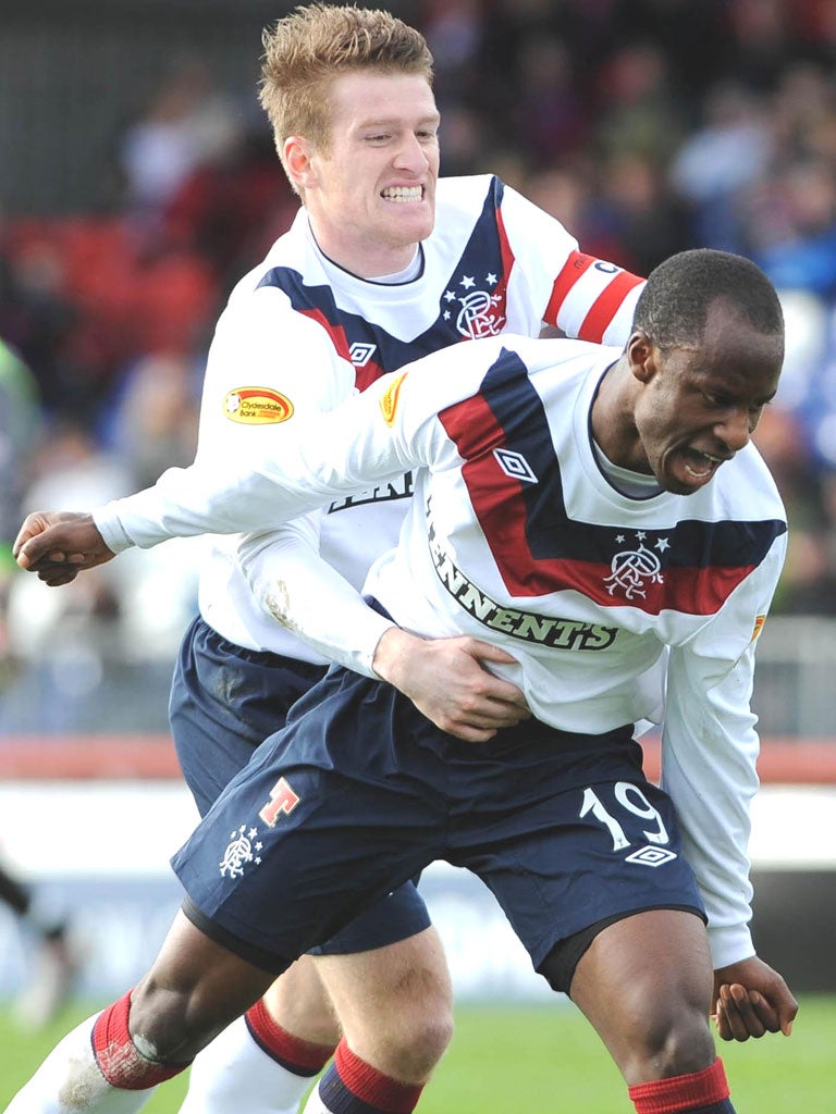 Rangers’ Sone Aluko celebrates scoring in the rout of Inverness