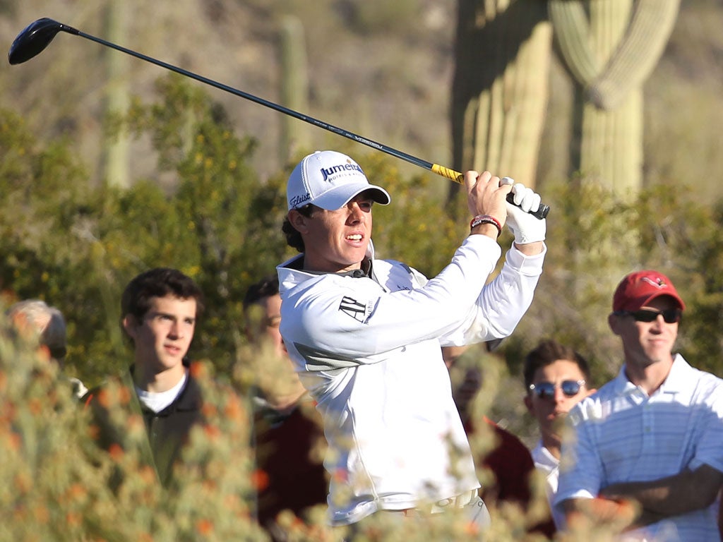 Rory McIlroy hits his tee shot on the seventh hole during the semifinal against Lee Westwood