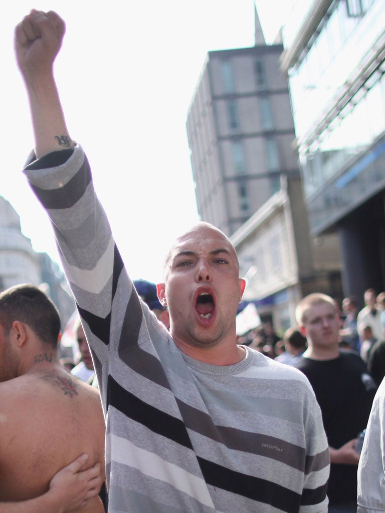 Members of the English Defence League (EDL) protest