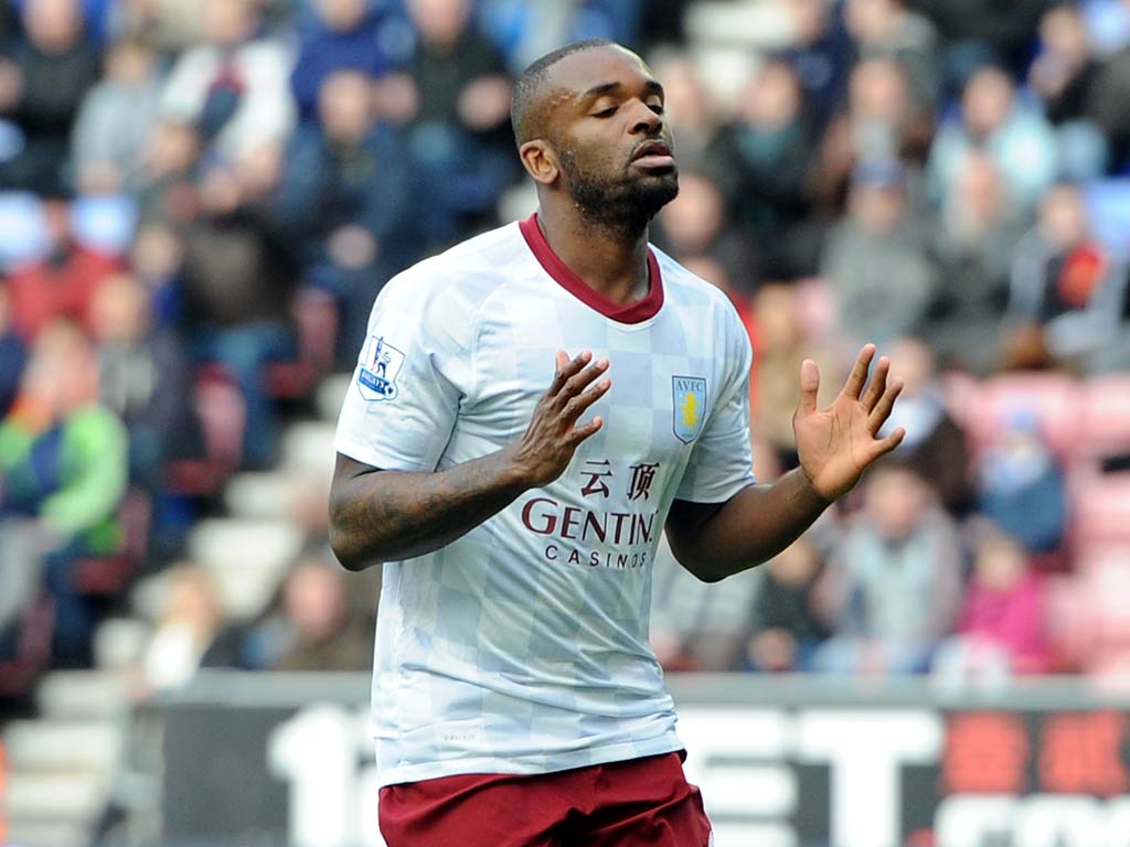 Darren Bent will miss England's friendly with Holland