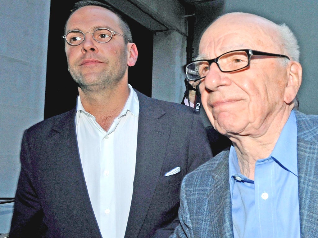 James Murdoch and his father, Rupert, in London last July