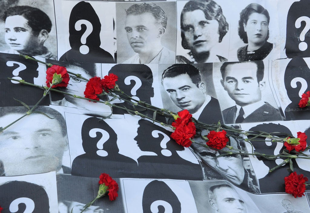 Missing: a banner displays pictures of people who went missing during Spain's civil war, at a demonstration in Madrid, February 2012