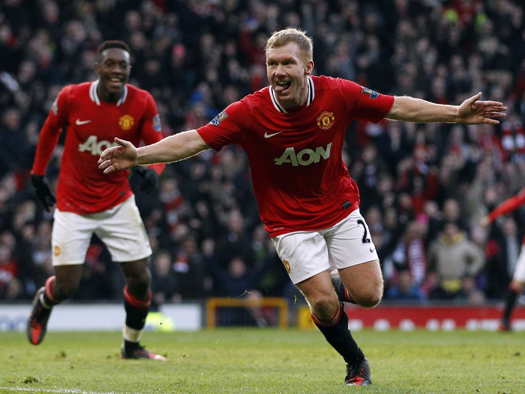 Paul Scholes celebrates scoring against Bolton on his return to United colours