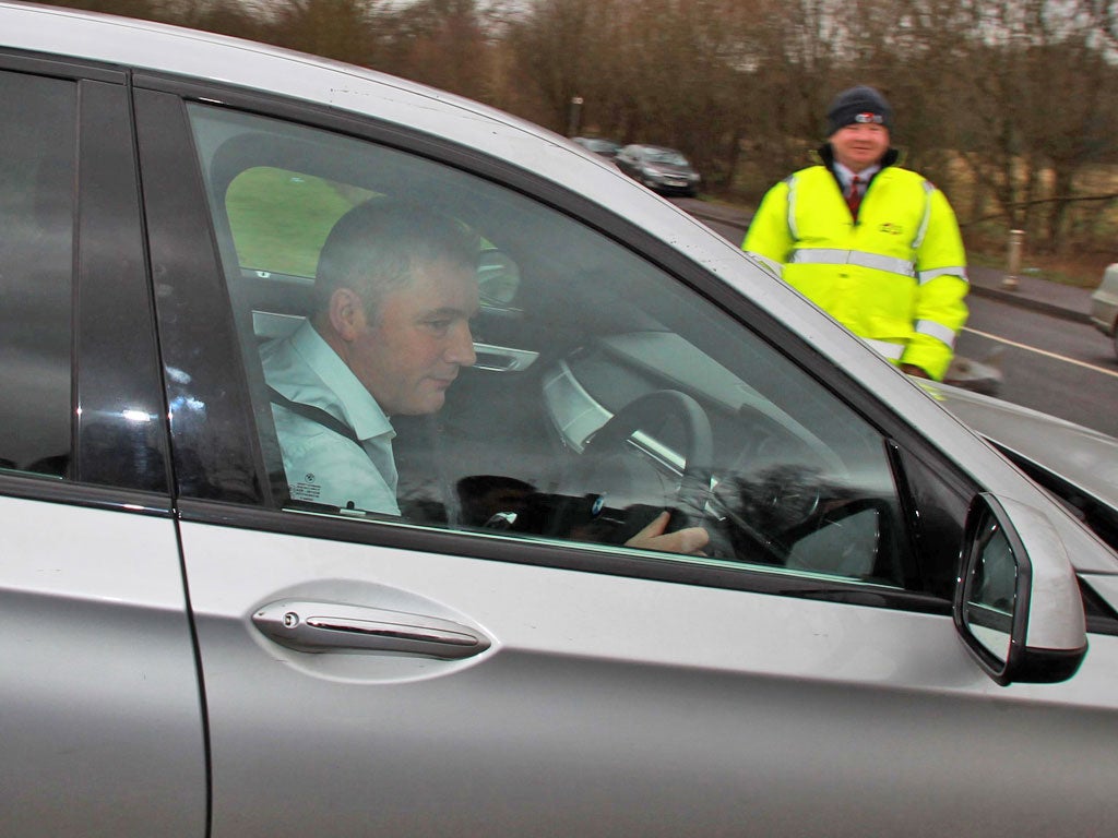 Rangers manager Ally McCoist leaves Murray Park in Glasgow yesterday