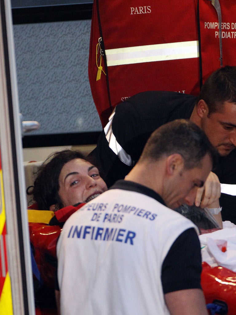 French journalist Edith Bouvier arrives in Paris yesterday