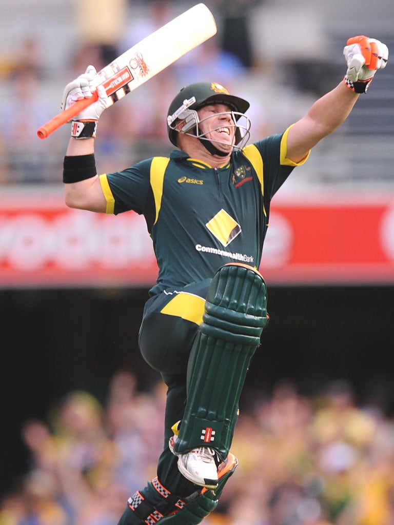 David Warner, of Australia, celebrates reaching his century
against Sri Lanka in Brisbane