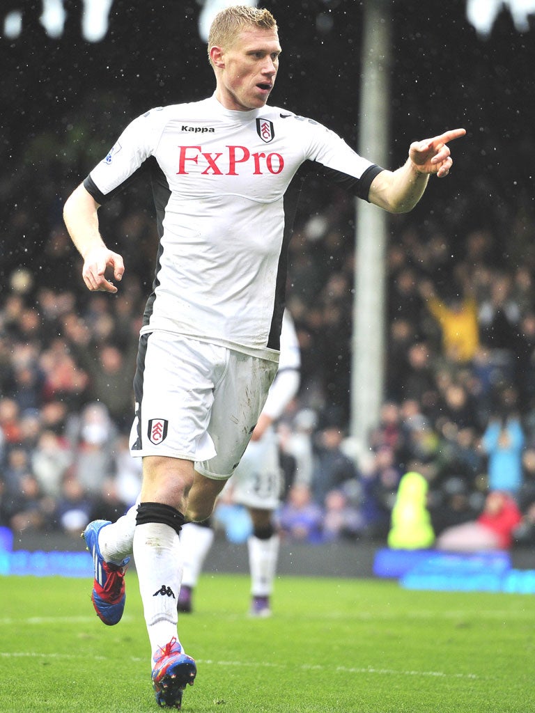 Fulham’s Russian striker Pavel Pogrebnyak celebrates his second goal