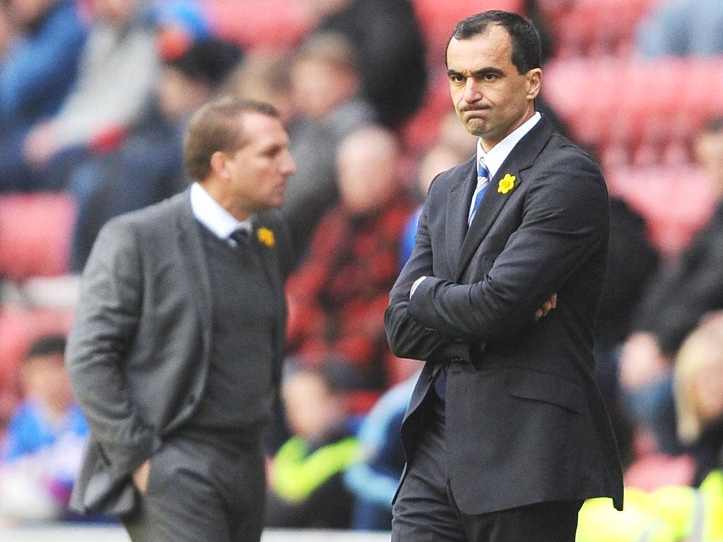 The team selection of Wigan manager Roberto Martinez was publicly questioned by chairman Dave Whelan