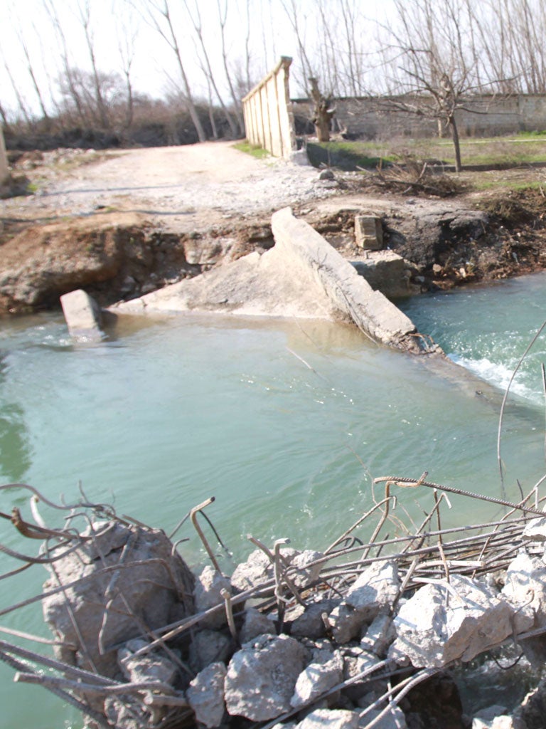 The ruined bridge across the Orontes river in Rableh
