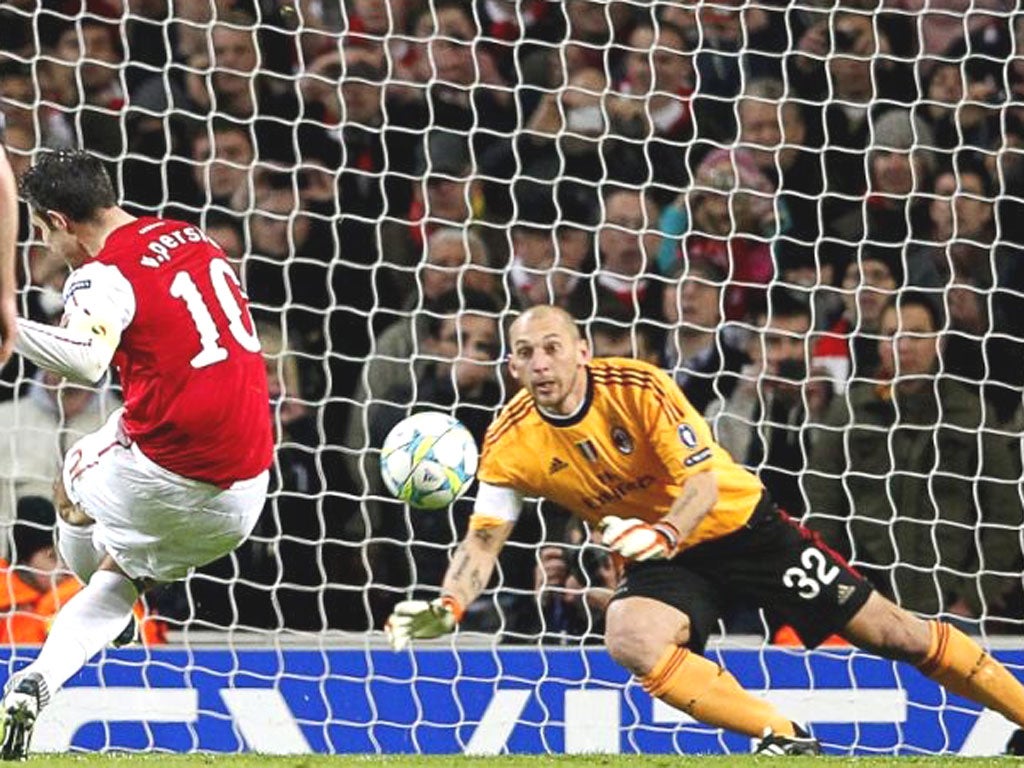 Robin van Persie smashes his penalty past Christian Abbiati