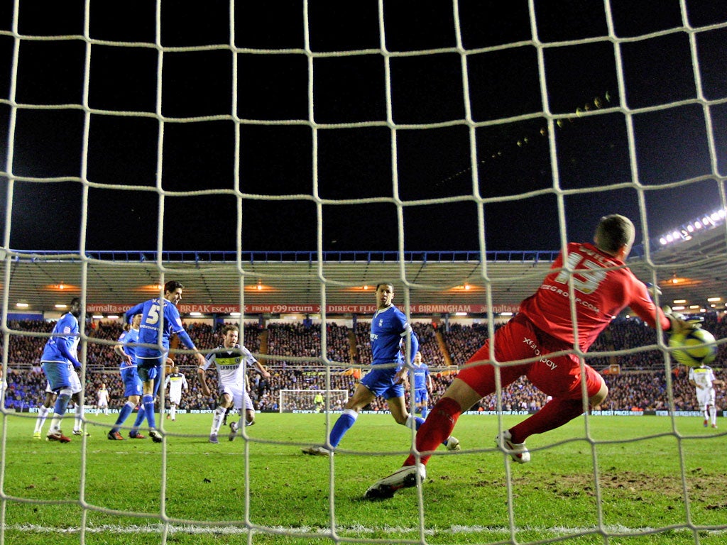 Juan Mata scores the opening goal against Birmingham City