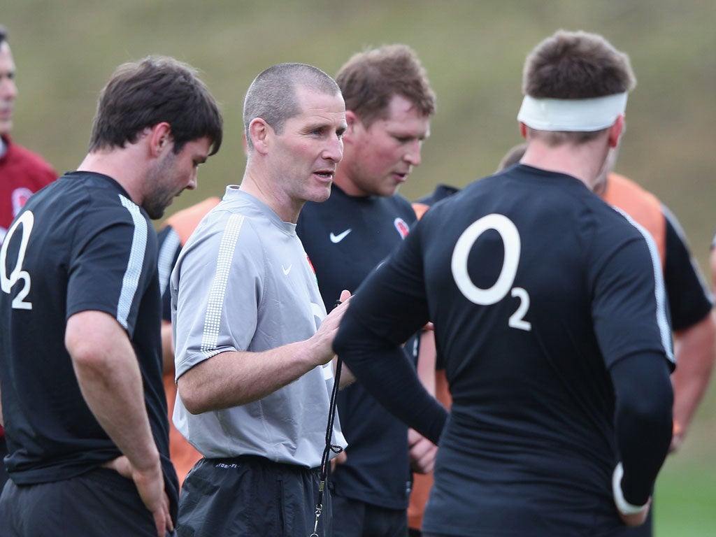 Stuart Lancaster, the England head coach, talks to his team at Pennyhill Park this week