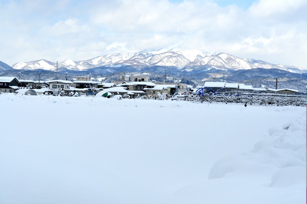 Ami and her mother are adjusting to life in snow-filled Yamagata - for both Ami and Sayaka, the snow has been one of the hardest parts to get used to. Ami has learnt to enjoy the snow, making snowmen and having snowball fights with her friends. Save the Children first met Ami in the weeks following the earthquake and tsunami that devastated their hometown of Ishinomaki, on the north eastern coast of Japan. Ami and her mother were living with hundreds of others in an evacuation centre, set up in a local school. Ami had been attending one of Save the Children’s Child-Friendly Spaces set up as a special place for children to go to while staying at the evacuation centres, where they could do and have fun, and get away from the stress and anxiety of the overwhelming change. Thinking back to the days after the earthquake and tsunami in Ishinomaki, Sayaka remembers the evacuation centre. "We all ate and slept in a school gymnasium, every day. At first, there was not enough aid, so sometimes we got hungry. But after, we got more than enough, and we really appreciated it. On top of the food, we were grateful for the play area that was made for children, and the people who were there to play with the children. The children would have been anxious without them." Without the support provided by Save the Children, Ami's mother says "the children would have stayed in the gymnasium the whole time. Of course, they would have played by themselves, but we wanted to have a place where the children could play more freely, with energy. We were very thankful."