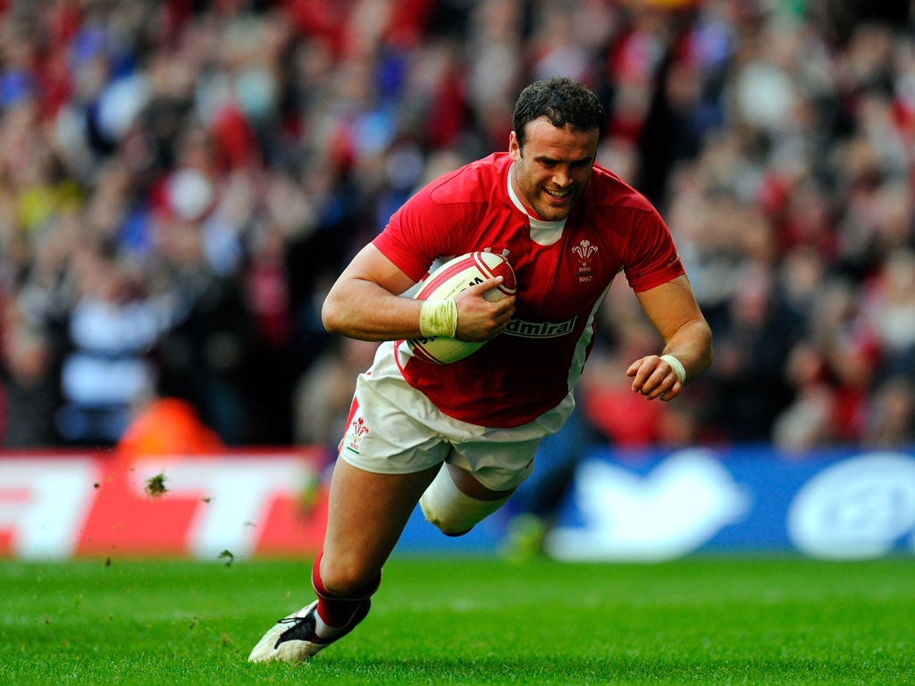 Wales centre Jamie Roberts scores