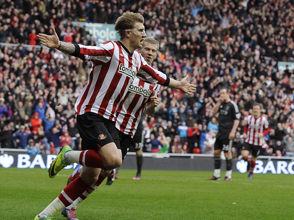 Nicklas Bendtner celebrates his goal