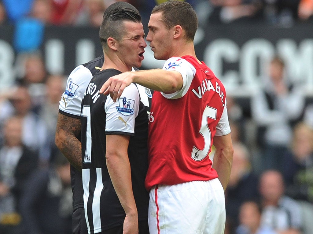 Joey Barton and Thomas Vermaelen argue after
Gervinho’s red card at St James’ Park