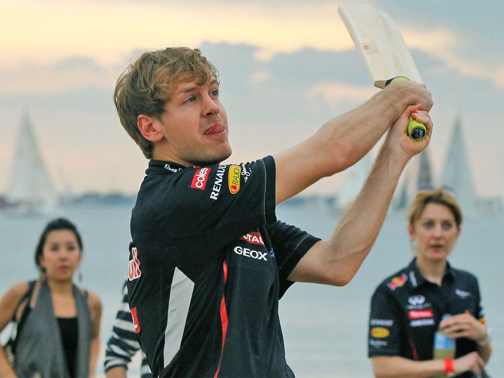 Sebastian Vettel relaxes in unexpected style with a game of cricket in Melbourne ahead of the Australian Grand Prix