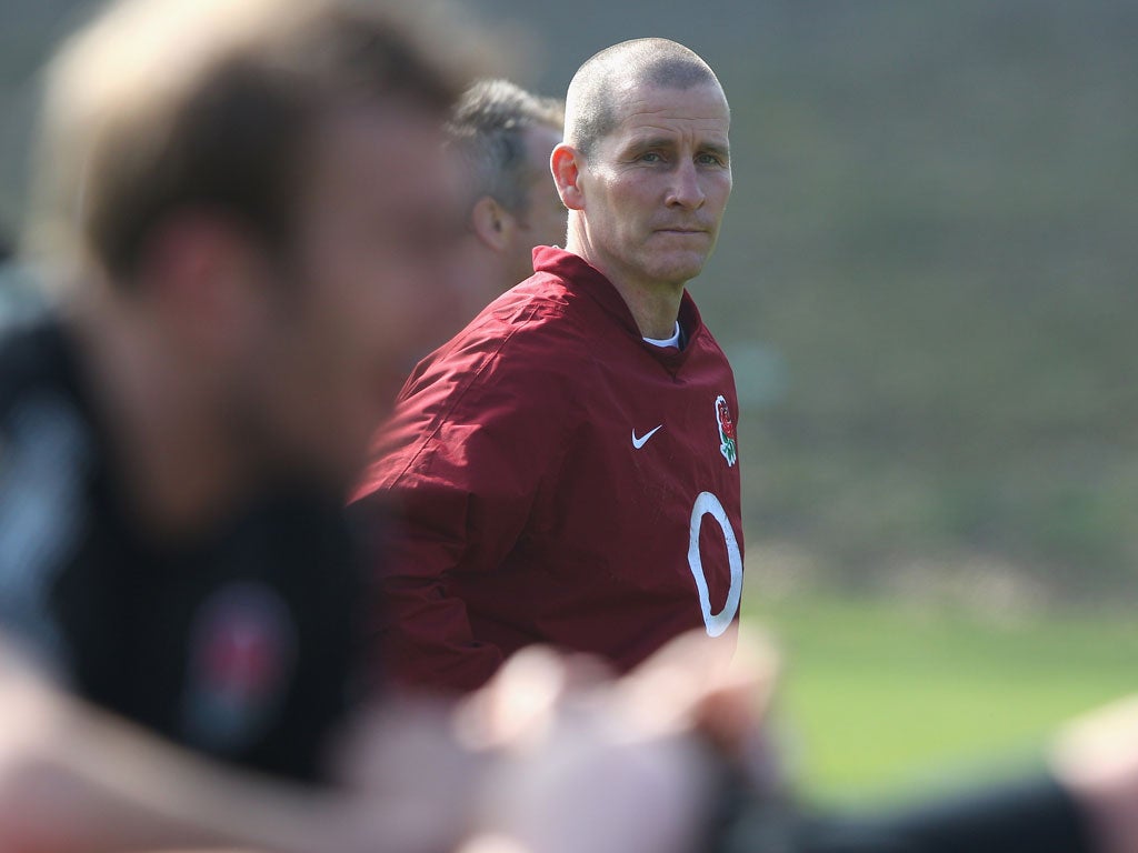 Stuart Lancaster supervises training at Pennyhill Park yesterday