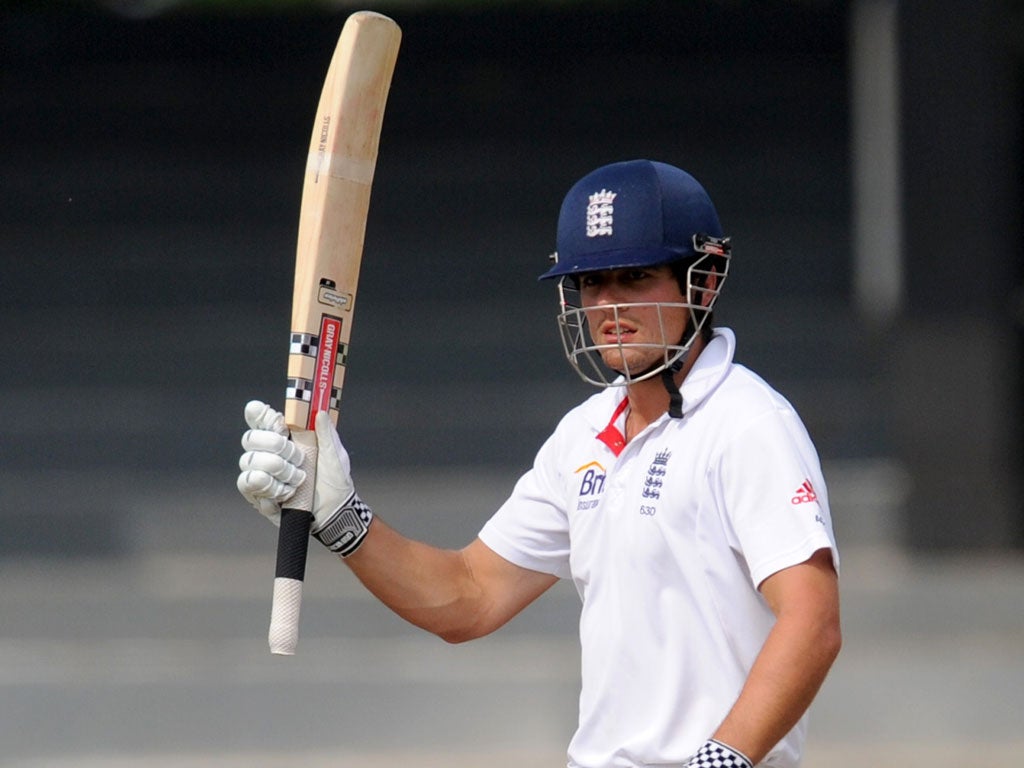 Alastair Cook celebrates his century for England in Colombo yesterday