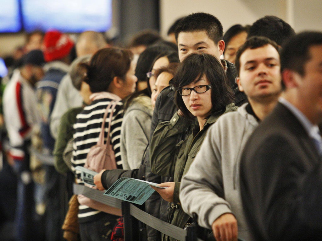 People queue for the new iPad in New York