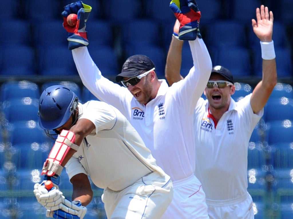 Cheers and confusion: Matt Prior leads the celebrations as Kanishka Alvitigala is caught behind