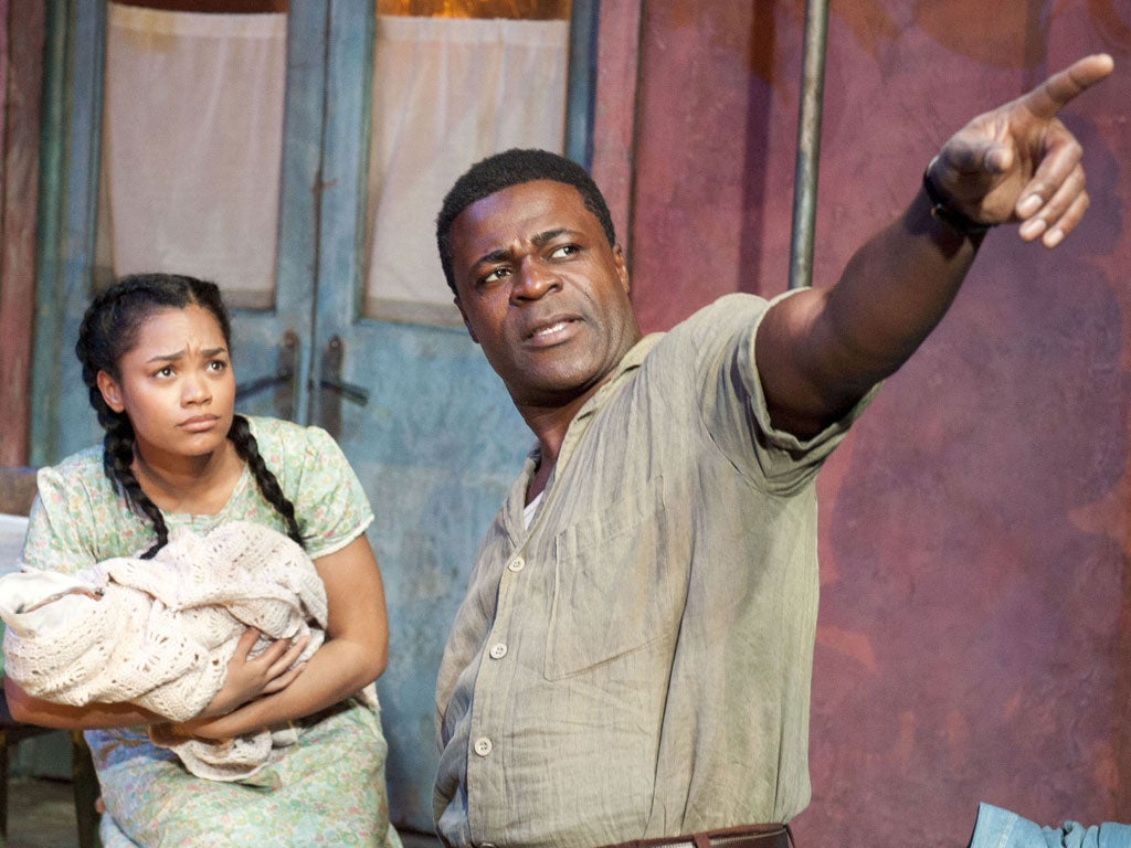 Danny Sapani as Ephraim, with Tahirah Sharif as Esther, in Errol John's 'Moon on a Rainbow Shawl', directed by Michael Buffong