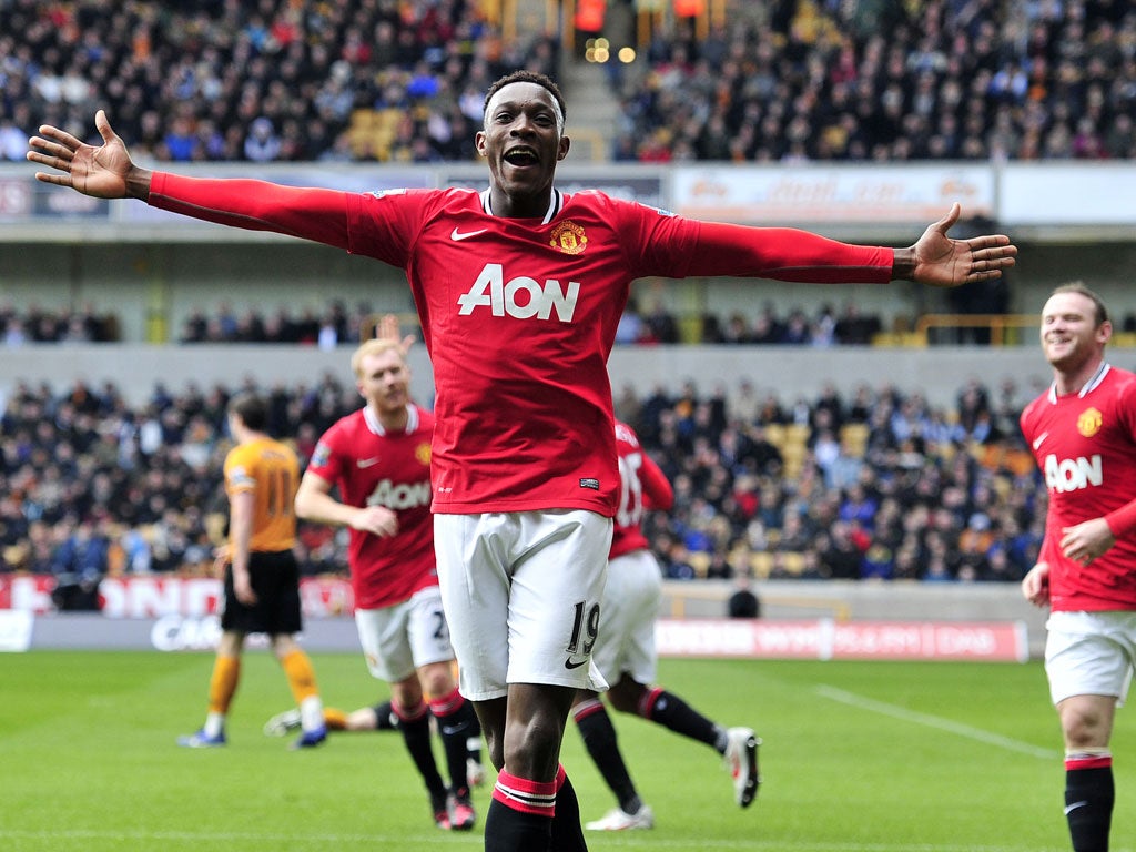 United striker Danny Welbeck celebrates scoring the team's third goal against Wolves