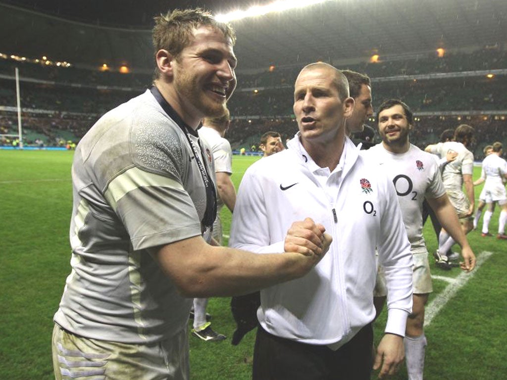 England coach Stuart Lancaster celebrates victory over Ireland with Ben Morgan