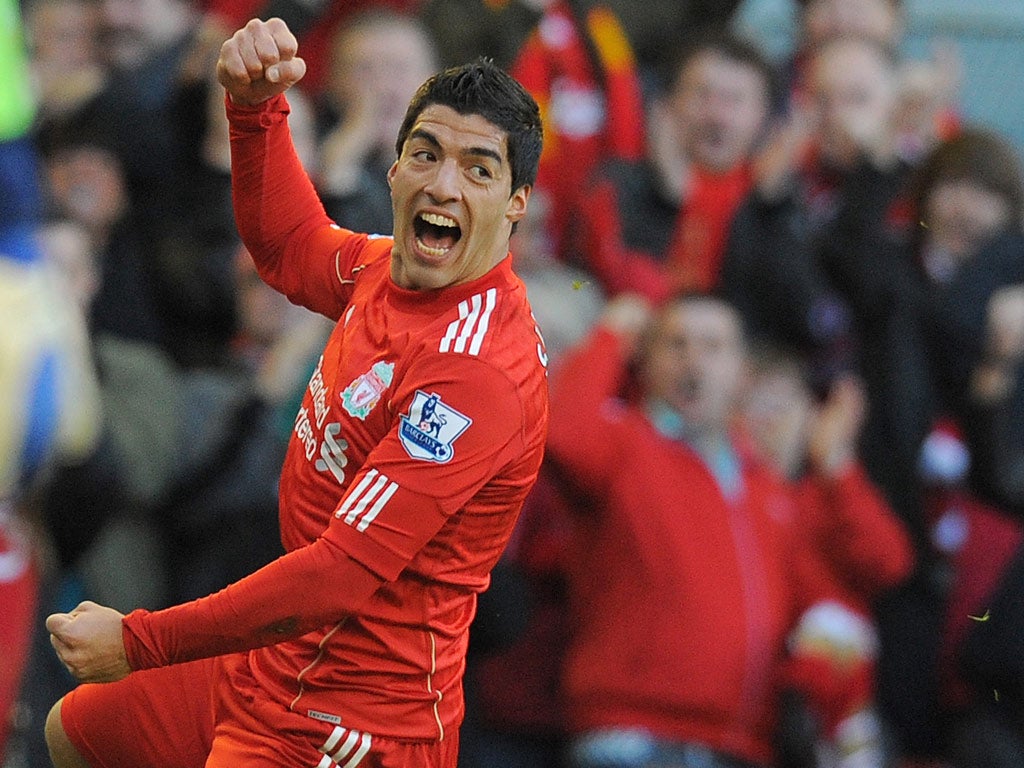 Suarez celebrates his goal against Stoke in the FA Cup