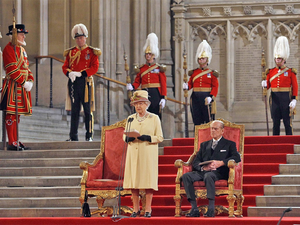 Prince Philip looks on as the Queen addresses both Houses of Parliament yesterday