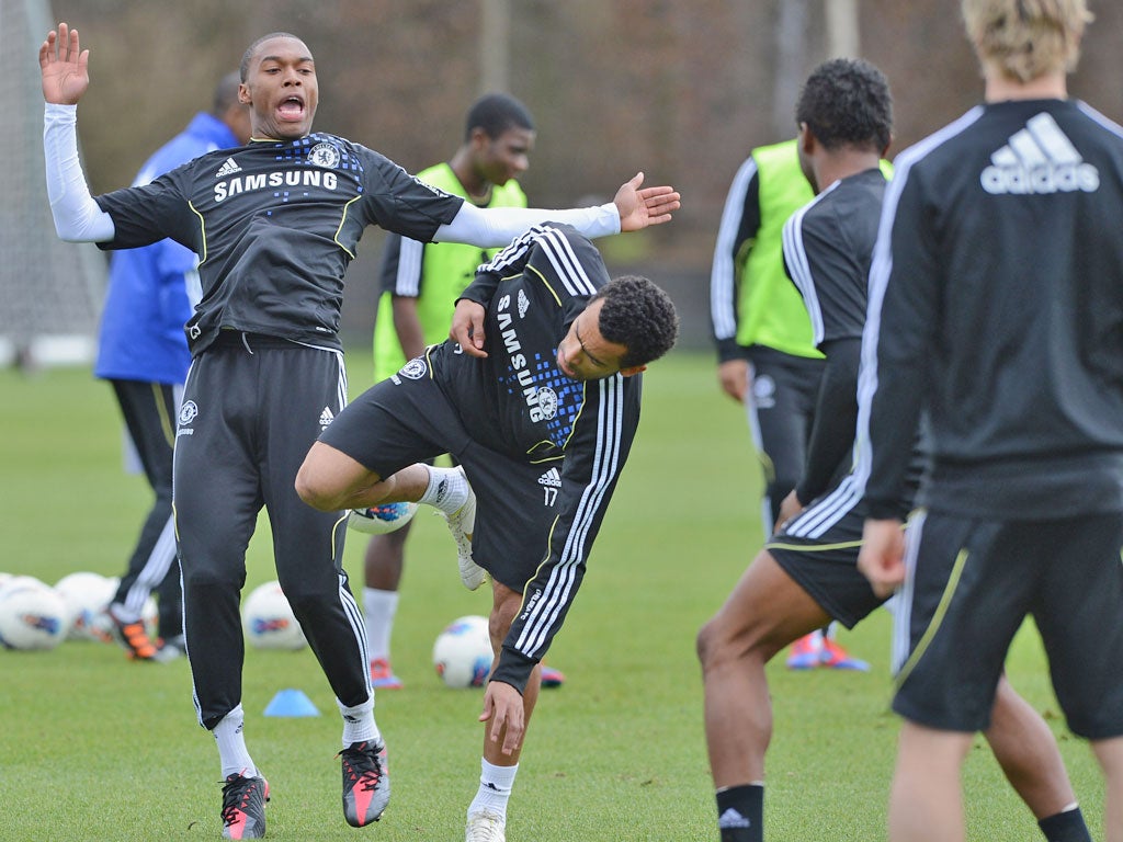 Daniel Sturridge (left) larks about at training yesterday. Chelsea will need the striker on top form tonight