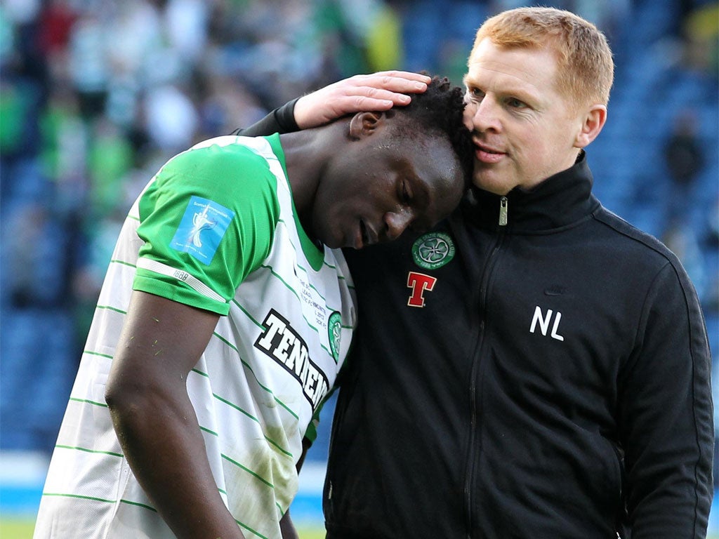 Victor Wanyama is comforted by Neil Lennon after losing the Scottish League Cup final