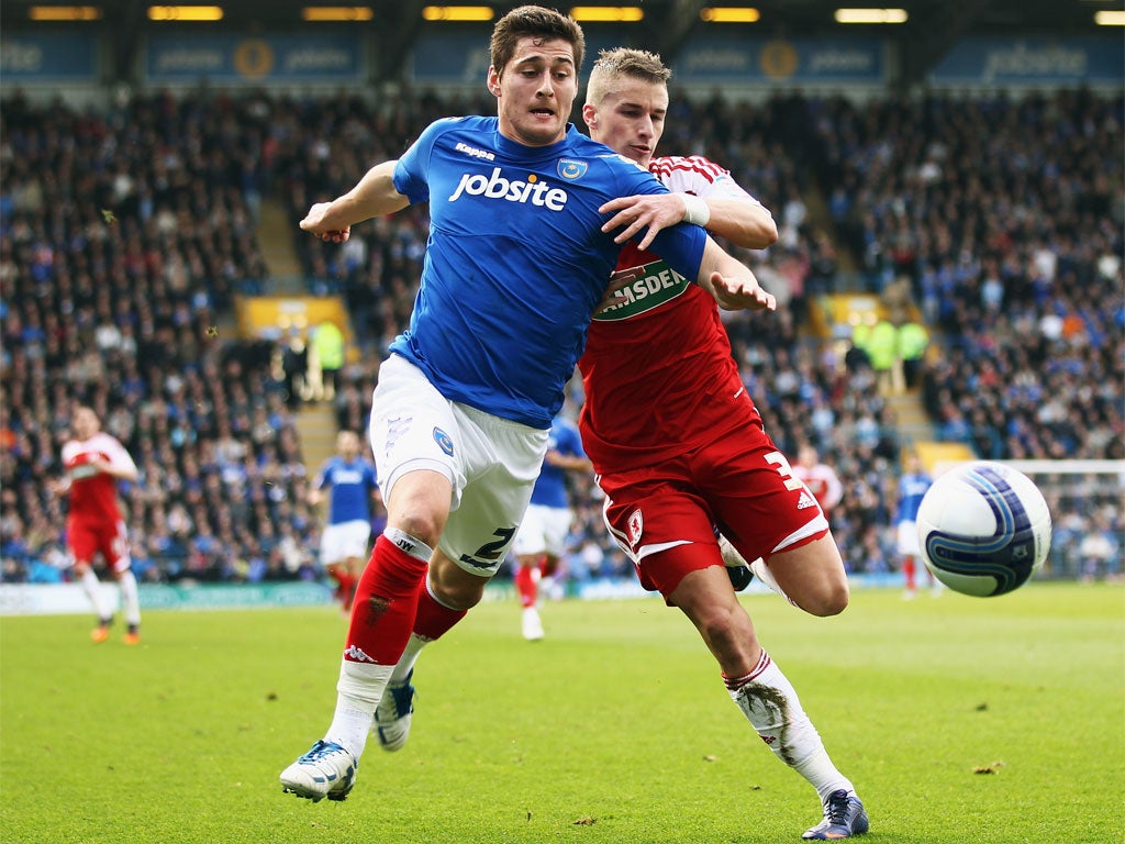 Portsmouth's Joel Ward (left) has been on Ipswich's radar