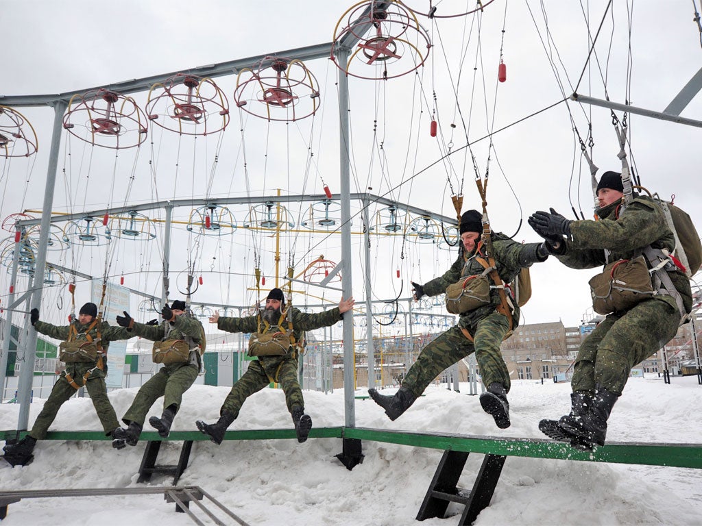 Orthodox priests of the Russian Airborne Forces at the Ryazan Higher Airborne School outside Moscow yesterday