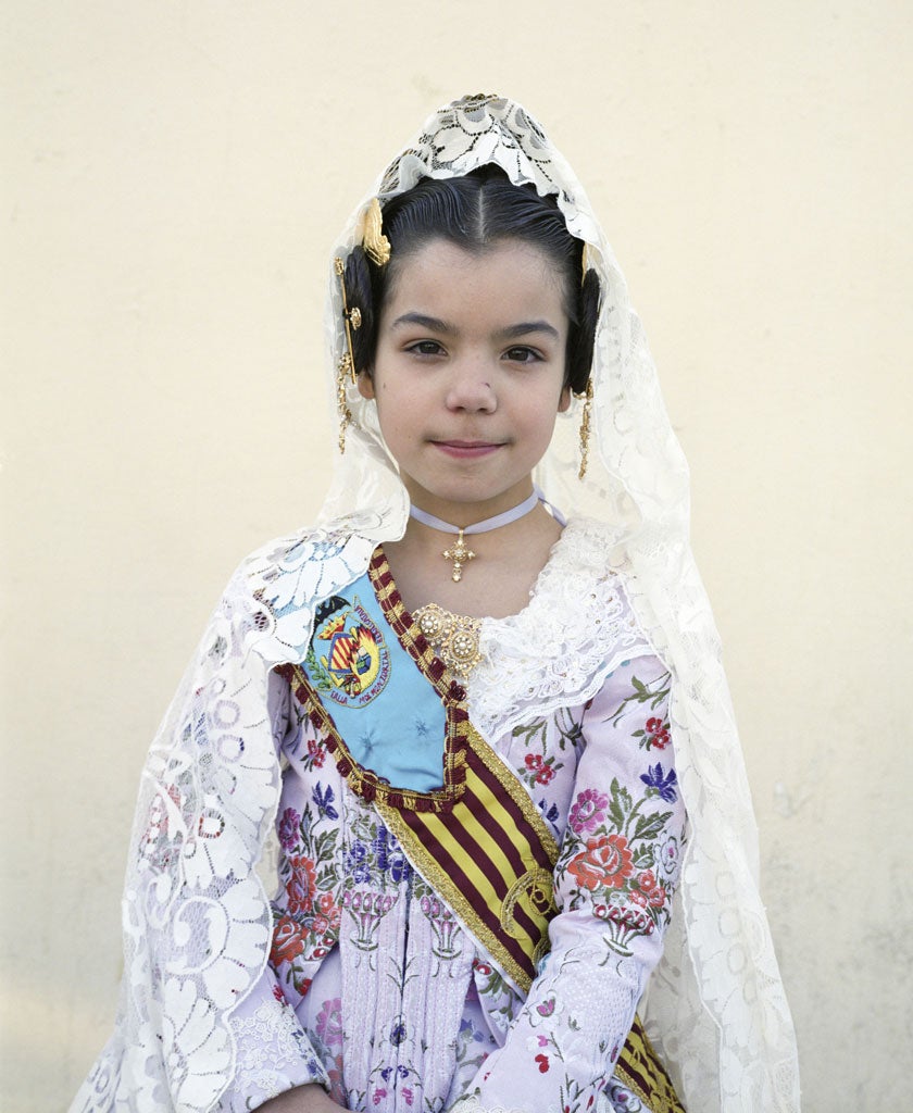 Pride comes before a falles: Aida prepares for the celebration, the red-and-yellow stripe of the Valencian flag on her sash