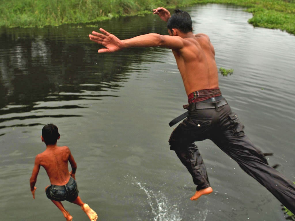 Bangladeshi children often play in and around water without supervision. Many have never learned to swim