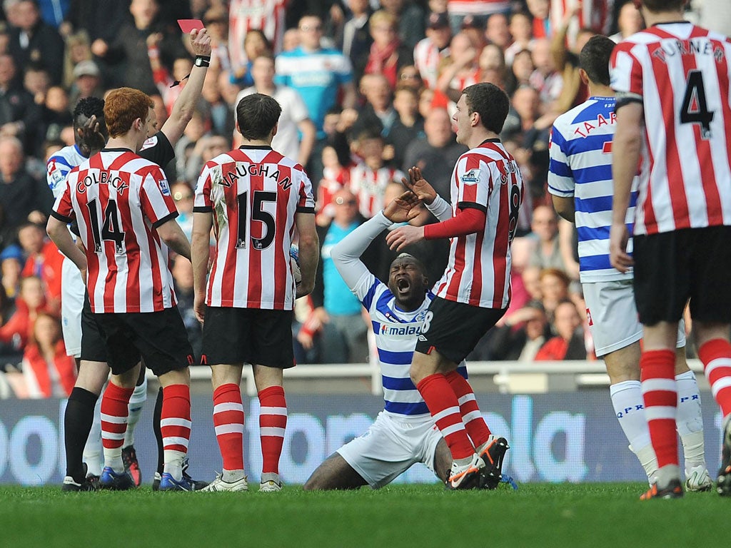 Red again: Djibril Cissé reacts to his sending-off at Sunderland, his second Rangers dismissal in the last five matches