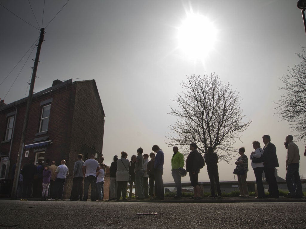 Customers queue for the final oatcakes