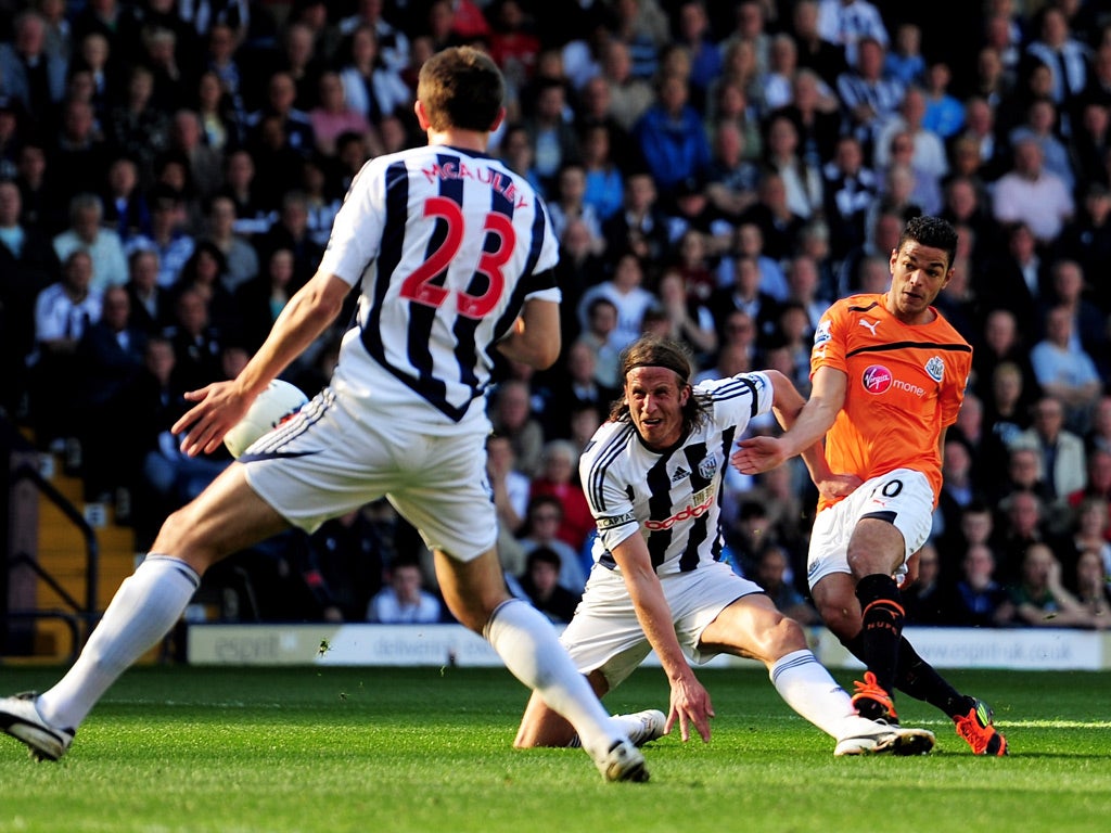 Hatem Ben Arfa (R) of Newcastle scores his team's second goal during the Barclays Premier League match between West Bromwich Albion and Newcastle United