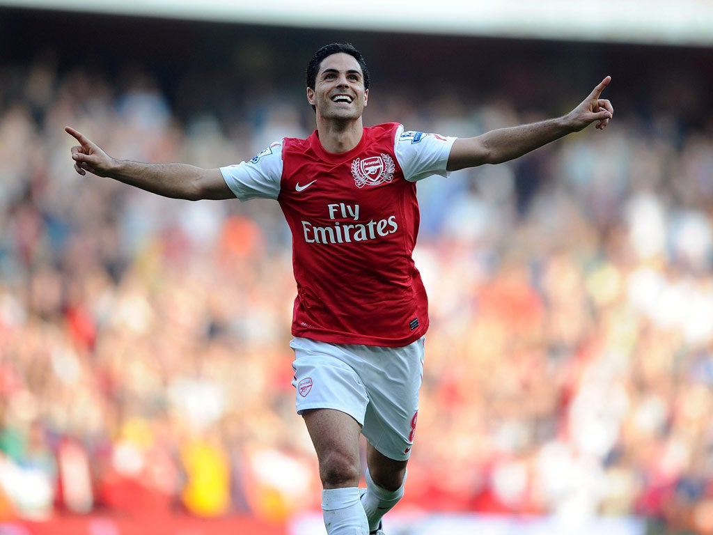 Arteta celebrates a fine free-kick against Aston Villa