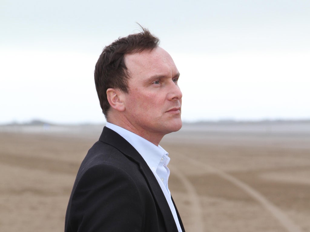 Clean at last: Kevin Dooley on the beach in Weston-Super-Mare, where he now lives