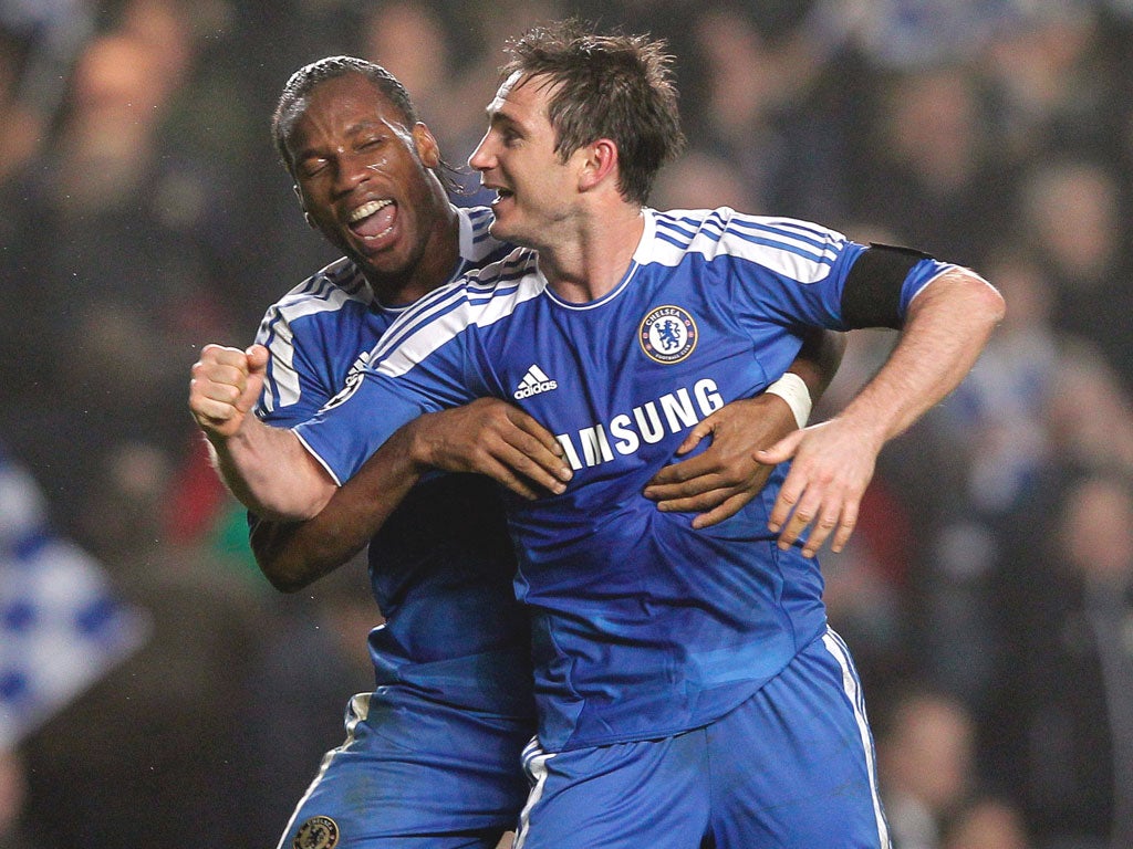 Frank Lampard, who said ‘there is no more room for slip-ups’, celebrates the win over Napoli with Chelsea team-mate Didier Drogba