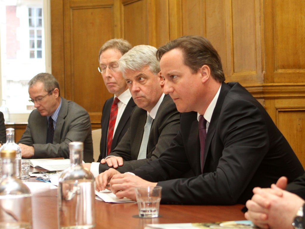 David Cameron sits alongside Health Secretary Andrew Lansley at a meeting with members of the Alzheimer's Society yesterday