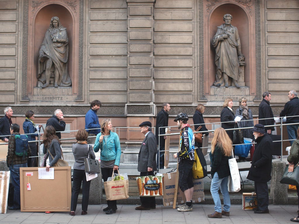 Artists arrive at The Royal Academy of Arts to hand in works completed for the 244th Summer Exhibition