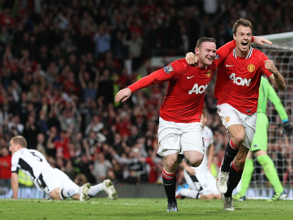 Manchester United 1-0 Fulham Wayne Rooney celebrates the only goal of the game against Fulham, as United win at Old Trafford to go 3 points clear at the top of the table.