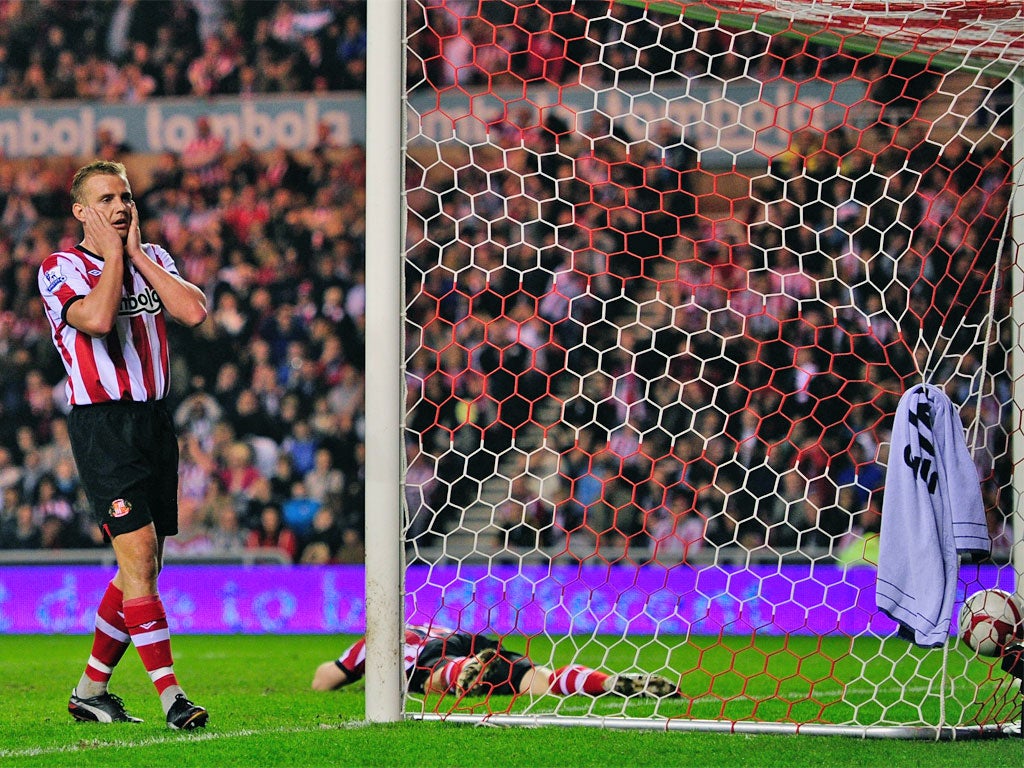 Lee Catermole (left) reacts dejectedly to David Vaughan's own goal