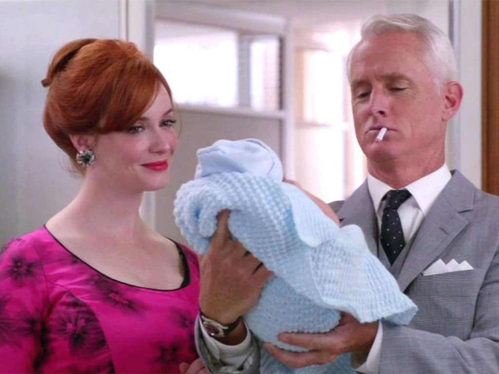 Christina Hendricks as Joan Holloway and John Slattery as Roger Sterling in 'Mad Men'