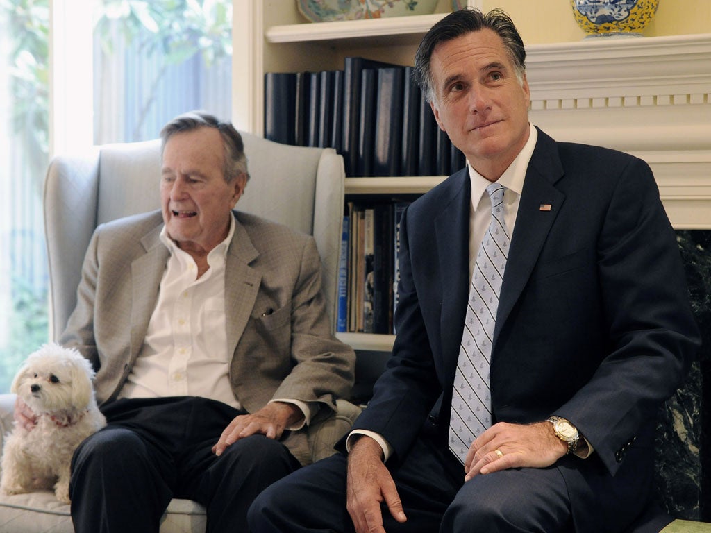 Former president Bush and Republican hopeful Mitt Romney in Houston in December 2011